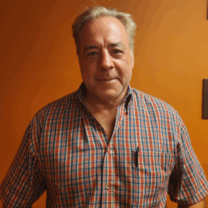 Greg Peak, CEO of Empire Solutions, smiles at the camera