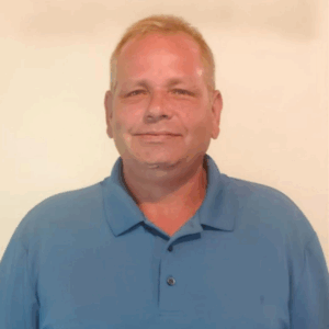 David Crockett smiles at the camera