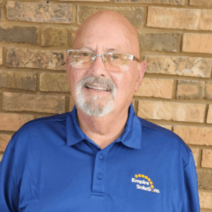 Pat Johnson smiles at the camera.